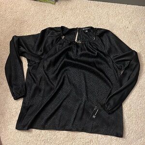 Black top with gold chain detail